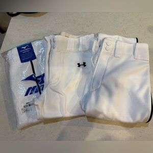 Three pairs of white baseball pants.  Sold as a bundle.  All youth XL